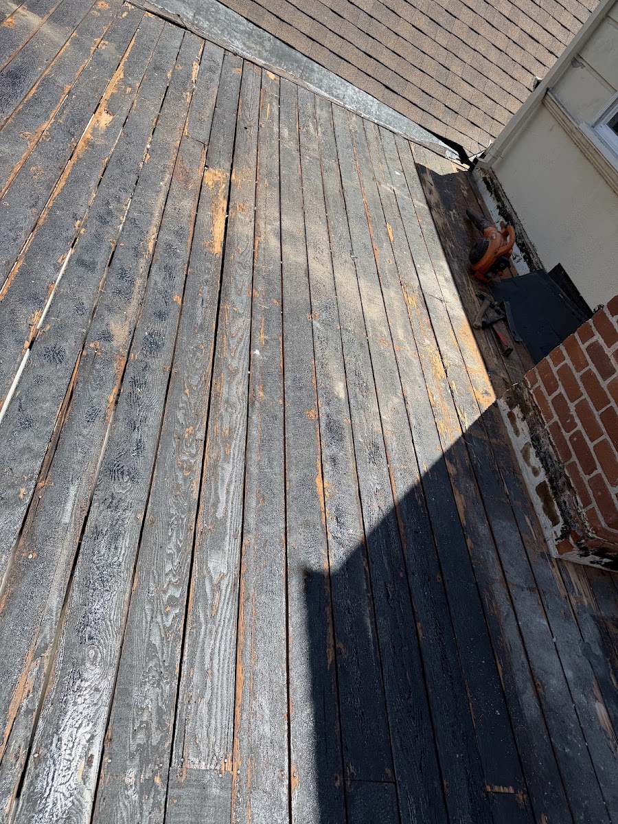Roof deck exposed during replacement preparation