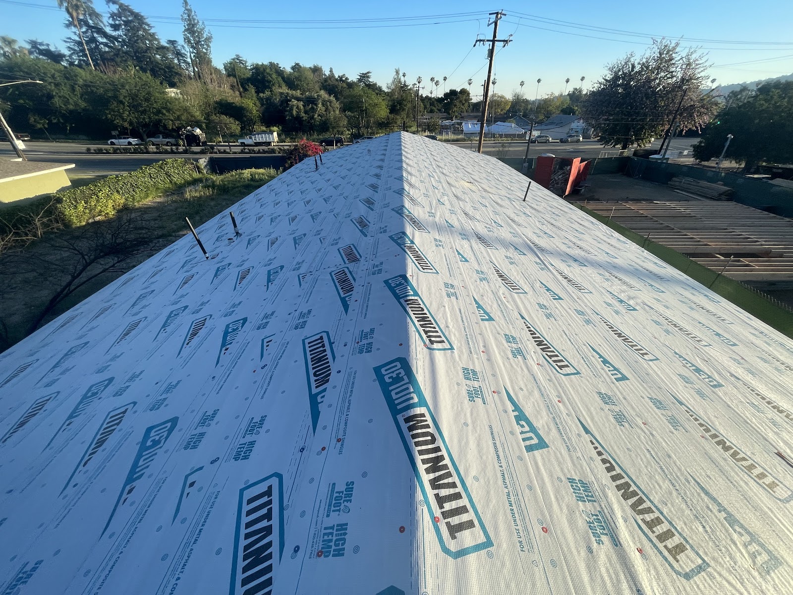 Underlayment installed across both sides of a pitched roof